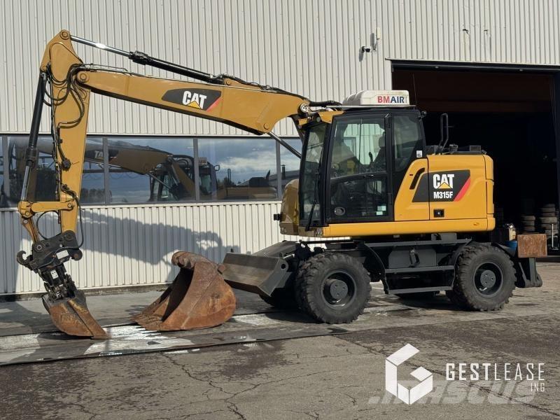 CAT M315F Колісні екскаватори