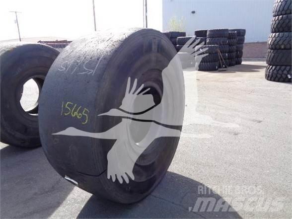 Titan 26.5x25 Шини