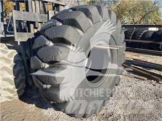 Titan 26.5x25 Шини