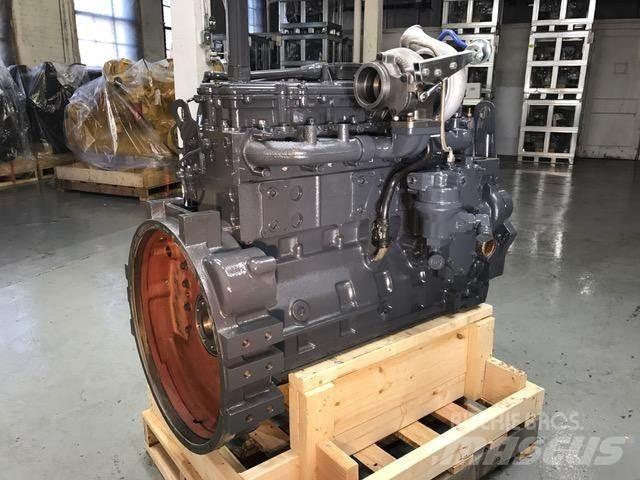 Komatsu MOST Двигуни