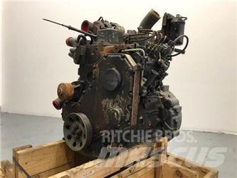 Komatsu SAA4D102E-2 Двигуни