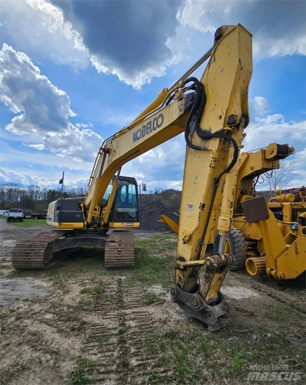 Kobelco Sk210LC Гусеничні екскаватори