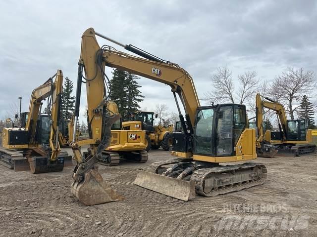 CAT 310 Гусеничні екскаватори