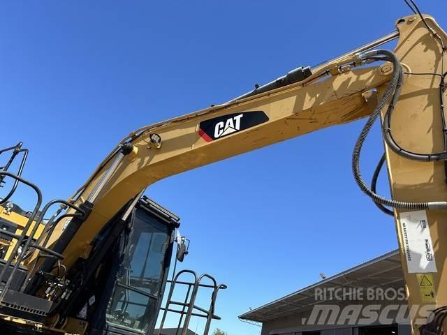 CAT 312E Гусеничні екскаватори