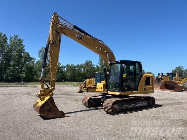 CAT 313 Гусеничні екскаватори