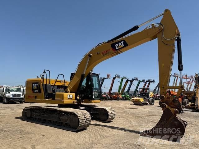 CAT 320 Гусеничні екскаватори