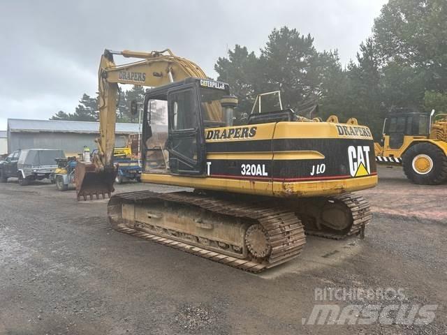 CAT 320L Гусеничні екскаватори