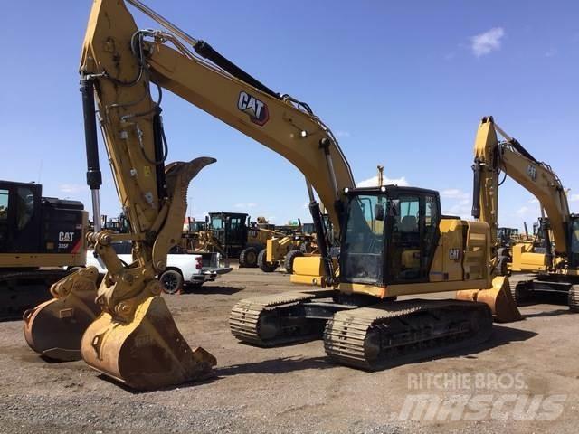 CAT 323 Гусеничні екскаватори