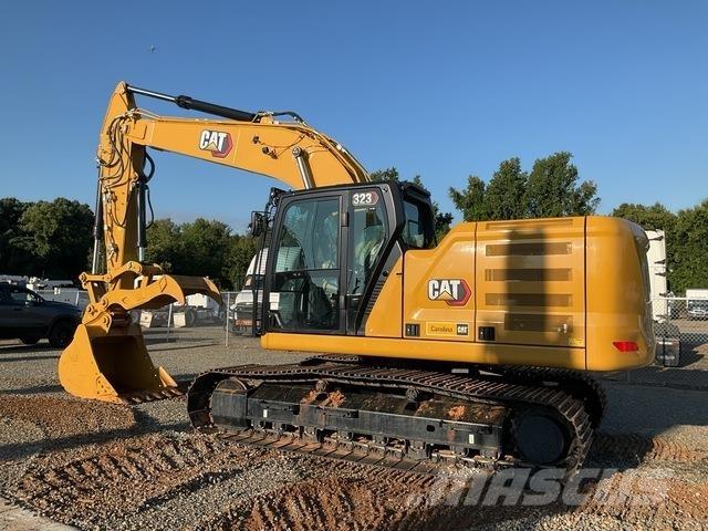 CAT 323 Гусеничні екскаватори