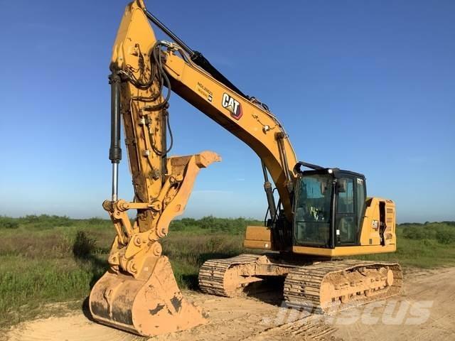 CAT 323 Гусеничні екскаватори