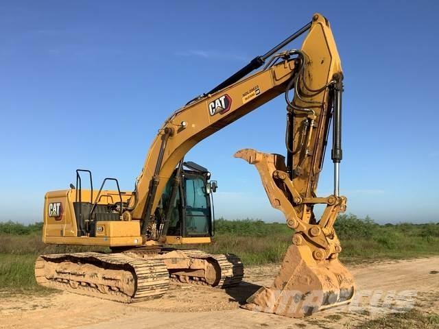 CAT 323 Гусеничні екскаватори