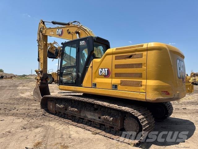 CAT 323 Гусеничні екскаватори