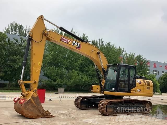 CAT 323GX Гусеничні екскаватори