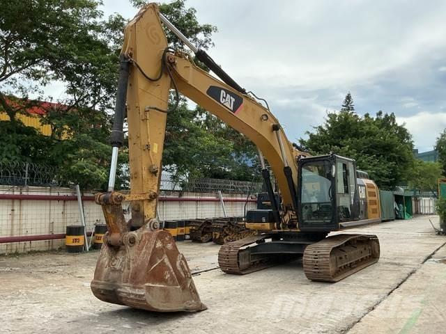 CAT 324E Гусеничні екскаватори