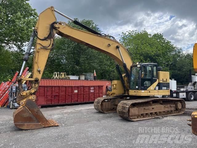 CAT 328 Гусеничні екскаватори