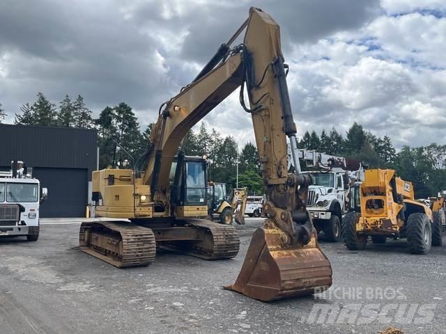 CAT 328 Гусеничні екскаватори