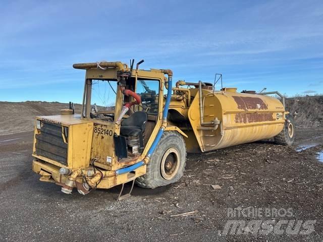 CAT 613B Поливальні машини