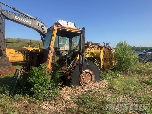 CAT 613C Поливальні машини