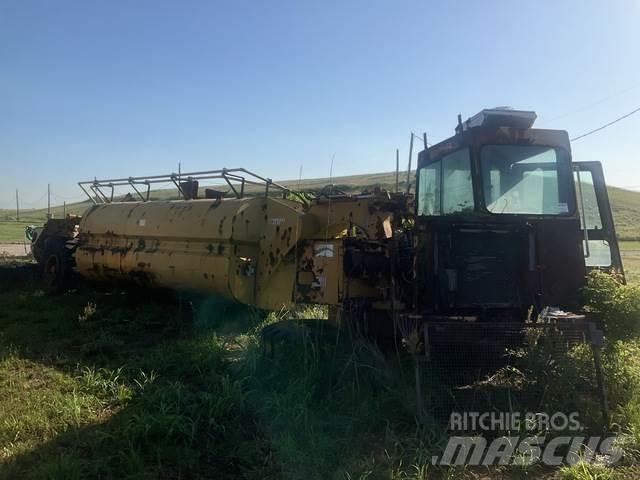 CAT 613C Поливальні машини