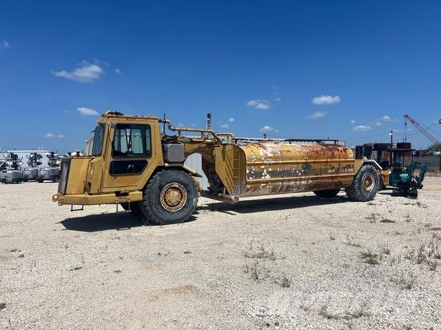 CAT 613C Поливальні машини