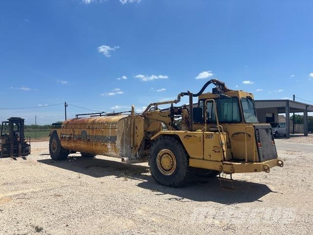 CAT 613C Поливальні машини