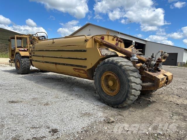 CAT 613C Поливальні машини