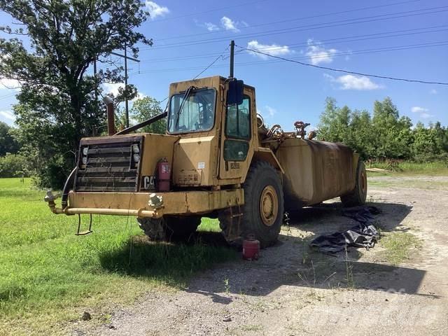 CAT 615C Поливальні машини