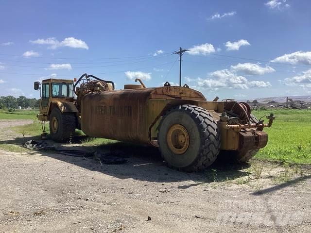 CAT 615C Поливальні машини