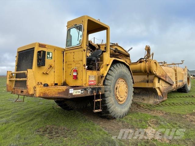 CAT 631D Поливальні машини