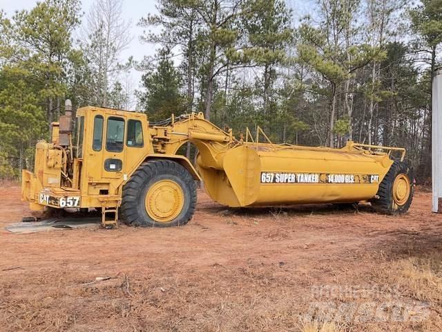 CAT 657 Поливальні машини