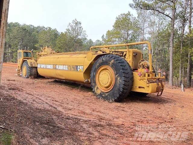 CAT 657 Поливальні машини