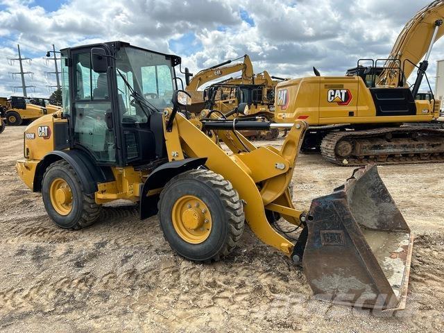 CAT 906M Фронтальні навантажувачі