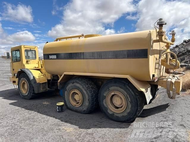 CAT D400D Поливальні машини