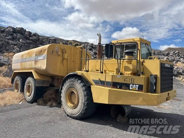 CAT D400D Поливальні машини