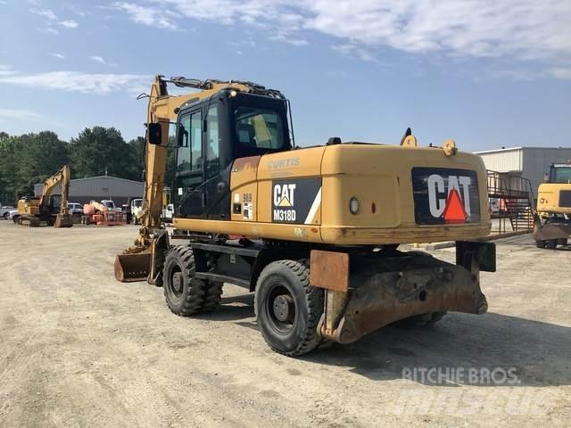 CAT M318D Колісні екскаватори