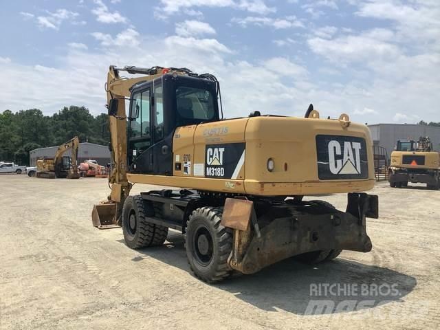 CAT M318D Колісні екскаватори