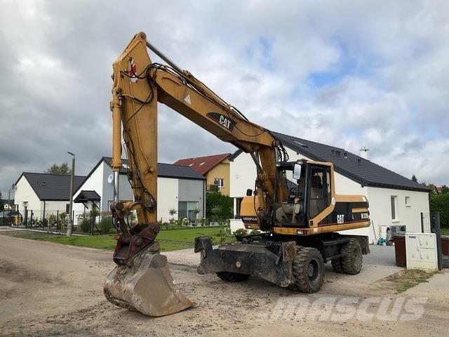 CAT M320 Колісні екскаватори