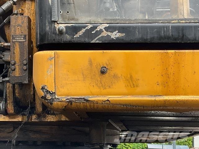 CAT M320 Колісні екскаватори