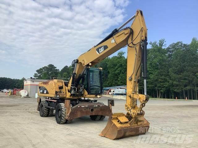 CAT M322D Колісні екскаватори