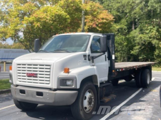 GMC C6500 Вантажівки-платформи/бокове розвантаження
