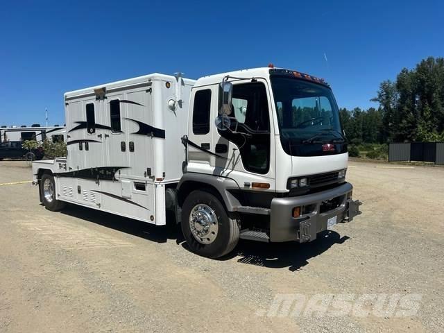 GMC T7500 Зчленовані самоскиди