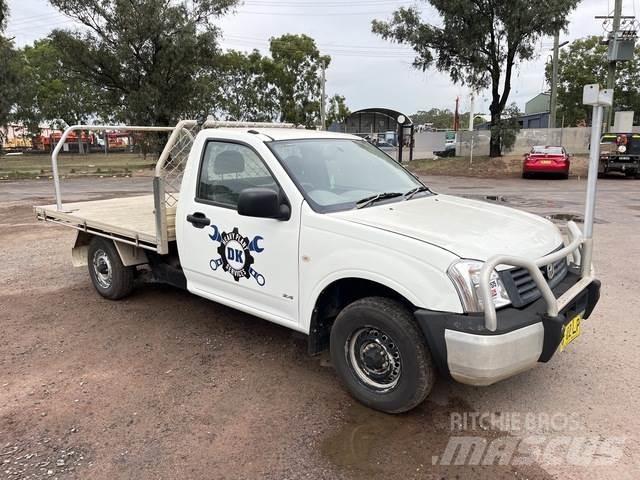 Holden Rodeo Пікапи / Бічне розвантаження