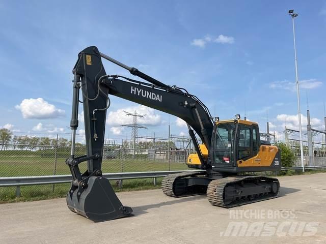 Hyundai R210 Гусеничні екскаватори