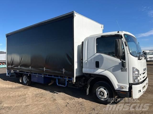Isuzu FRR 600 Тентовані вантажівки