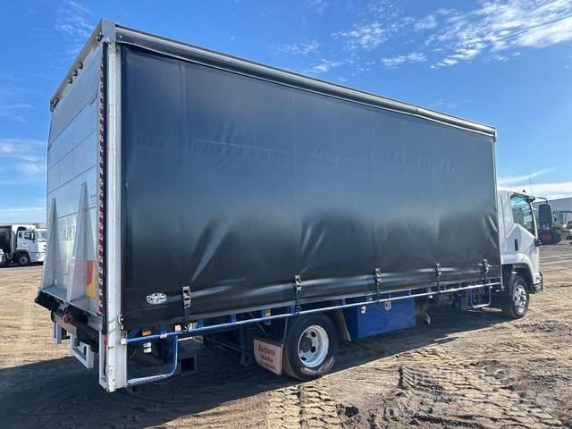 Isuzu FRR 600 Тентовані вантажівки