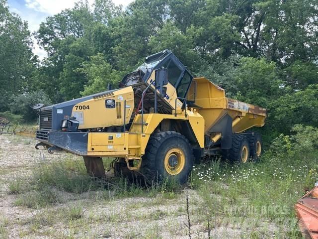 Komatsu  Зчленовані самоскиди