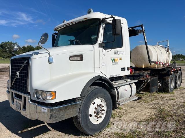 Volvo VHD64 Скіпові навантажувачі