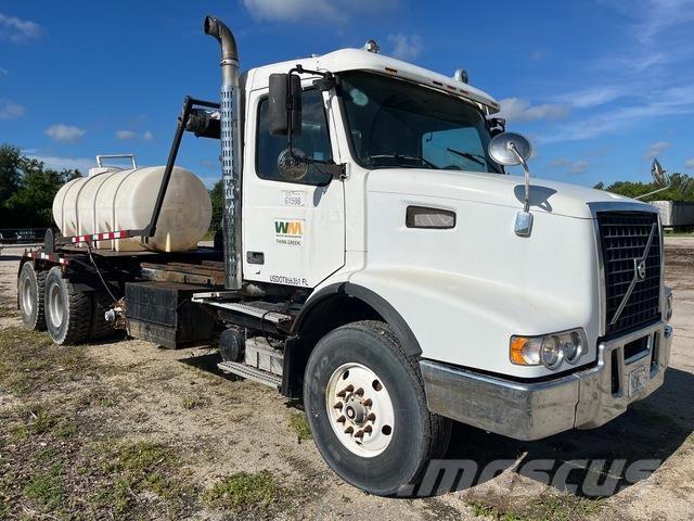 Volvo VHD64 Скіпові навантажувачі