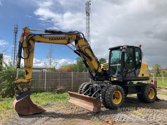 Yanmar B110W Колісні екскаватори