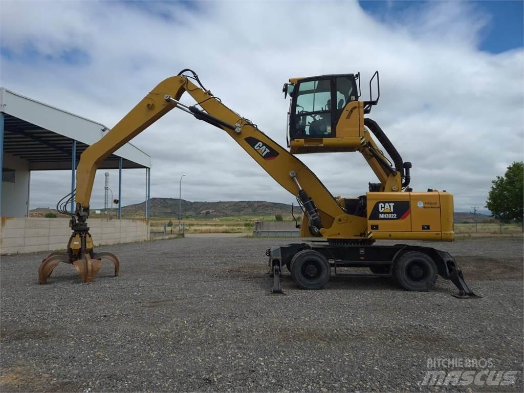 CAT MH3022 Колісні екскаватори